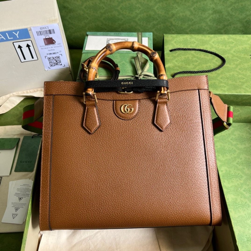 G*u*i top handle bags
